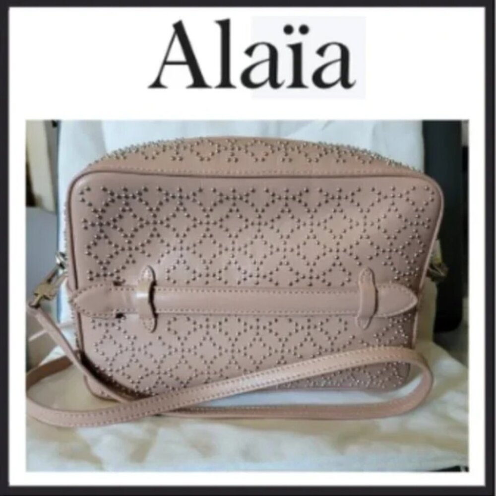 Alaia studded Arabesque across body bag in sable